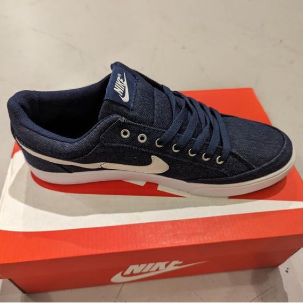 Nike Men’s Navy Blue Canvas Low-Top Sneaker with White Swoosh